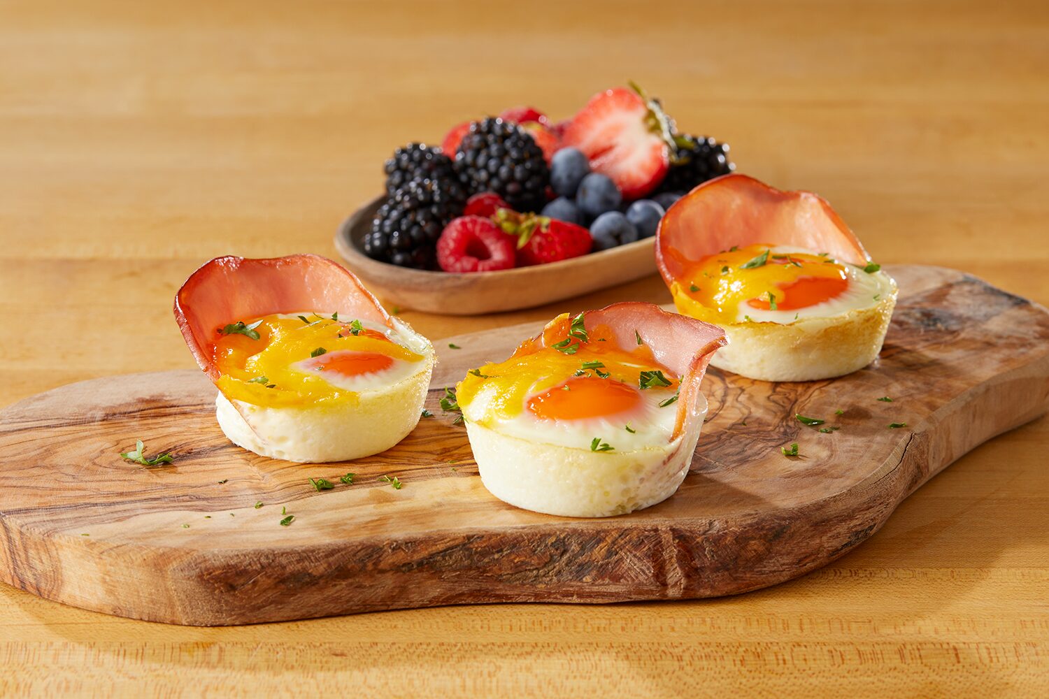 Canadian Bacon and Egg Cups with berries