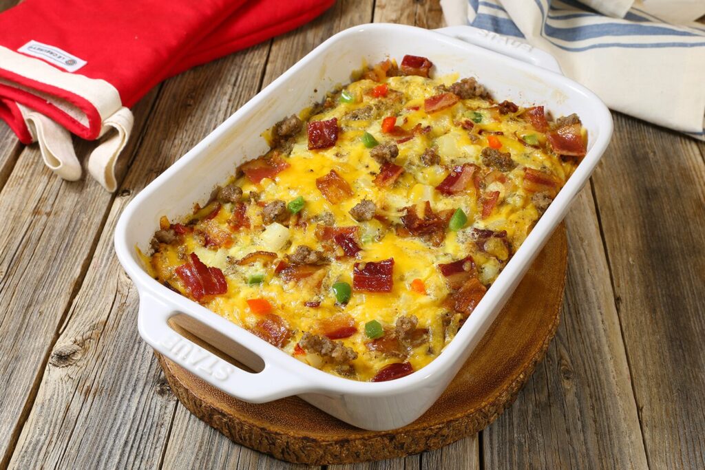 Fully Loaded Cheesy Breakfast Casserole with bacon, sausage, cheese, and hash browns