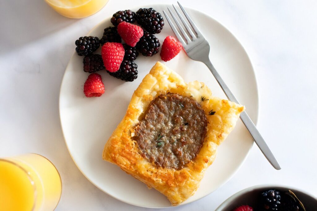 Puff pastry breakfast tart with sausage patty