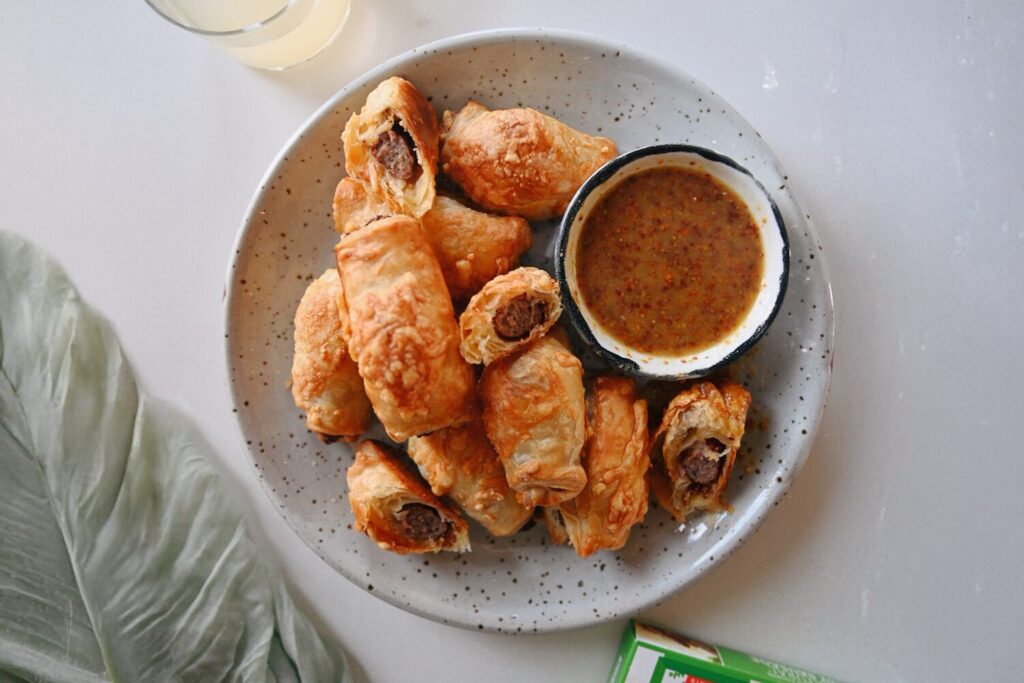 Sausage and cheese in a blanket appetizers with a whole mustard dipping sauce