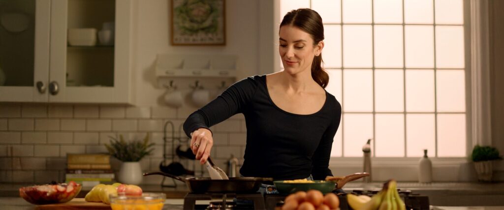 Lisa Caras cooking in the kitchen