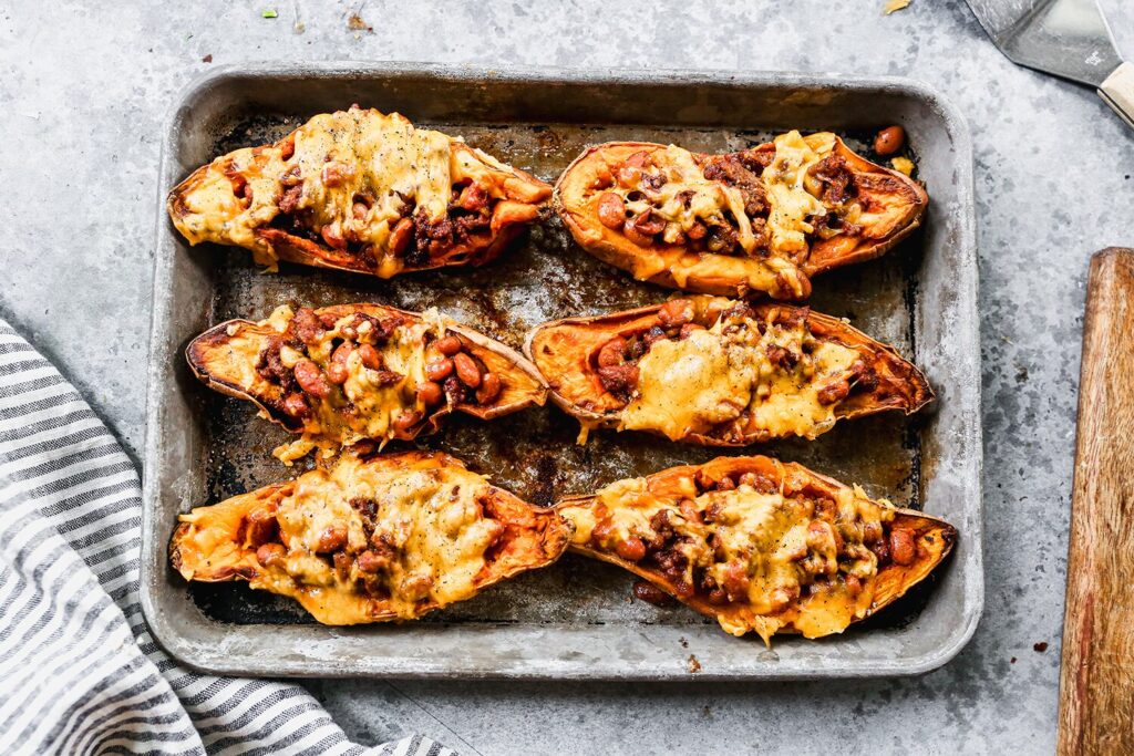 Sweet potatoes stuffed with a sausage and kidney bean chili