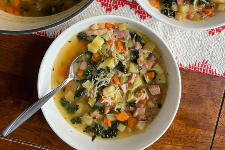 A bowl of ham and white bean soup.