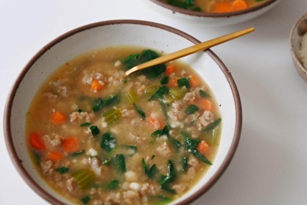 Gluten free Italian Wedding soup with spinach and chicken sausage